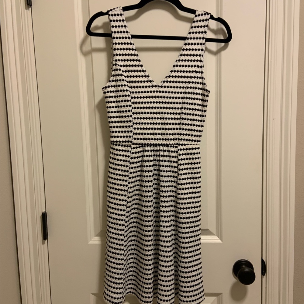 Black and white open back dress.